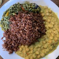 Lunch meal deal with chickpea curry, grains & callaloo   at Eat of Eden in South West London