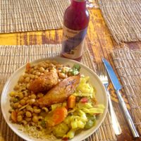 Plate of the day and blueberry ice tea. at BongoRoots in Tubingen