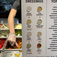 Piada - marked vegan dressings on the menu (yogurt harissa, lemon basil, oil & vinegar)   at Piada Italian Street Food in Washington Township