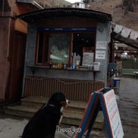 exterior of the caravaan restaurant. it's a take out. can either sit at tables outside or be served at restaurant next door.  at La Cocina de Luz in Telluride