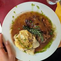 seitan roll filled with almond cream with potato gratin and a delicious sauce at Marie e Oli's in Armacao De Pera
