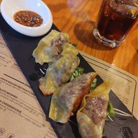 Gyozas. Very interesting (but very tasty!) gyozas.  Peanut sauce was a great addition! at MESTIZA in Valencia