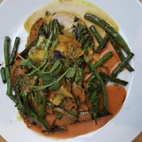 Quinoa cake with Thai curry sauces  at Blue Mountain Vegan in South East London