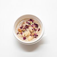 Makhana, nuts, dry fruits cooked in in-house plant-mylk, flavoured with rose and saffron, sweetened with dates and organic jaggery. Allergen - Nuts. Jain-friendly (no roots)
 at Tralata in Mumbai