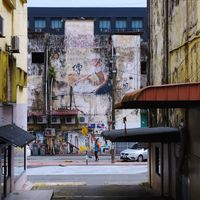 Cafe on the left when you see this wall art. at Origin Cafe 初 in Kulai