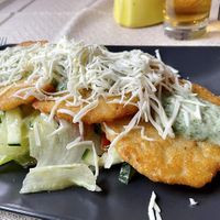 Burgonyàs Langos - Kartoffelpuffer with cheese and the best wild garlic sauce  at Arcadia Restaurant in Abrahamhegy