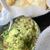 Tasty guac, but chips are extra.   at Hamburguesas El Gordo in St Paul