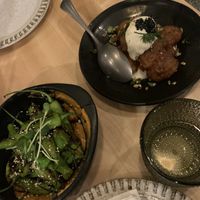 Shishito peppers and lentil hummus; Yukon gold potatoes with hearts of palm crema at Bloom in Chicago