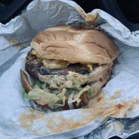 Sloppy Toppy - I moved the burger around a bit to get a good shot of all the toppings at Slutty Vegan - Edgewood in Atlanta