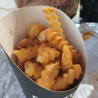 All burgers come with seasoned fries. at Slutty Vegan - Edgewood in Atlanta