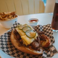 Philly Cheesesteak with Rudy's Fries and a Cola. at Rudy's Vegan Butcher & Diner in North London