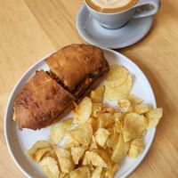 Vegan Banh Mi plus chips and an Oat Latte at Melo Coffee & Kitchen in Rochester