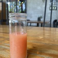 Complimentary watermelon juice shooter  at Gypsea Market in Tulum