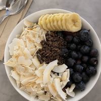Açai bowl with banana, coconut, cacao nibs and blueberries   at Love Juice Bar - Grenelle in Paris