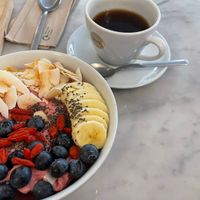 Raspberry bowl and coffee   at Love Juice Bar - Grenelle in Paris