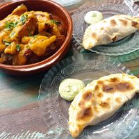 Patatas bravas y empanada at Santa y Pura in Madrid