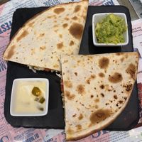 Quesadilla (11€) with avocado and jalapeño cheese. at Santa y Pura in Madrid