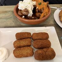 Patatas bravas / aioli / croquetas  at Santa y Pura in Madrid