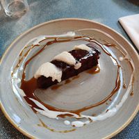 Chocolate brownie with ice cream at Harp & Crown in Corsham