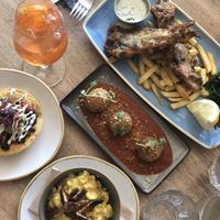 Fish and chips, butternut squash arancini with tomato sauce, beans tostada, Mac and cheese with tempeh bacon at Harp & Crown in Corsham