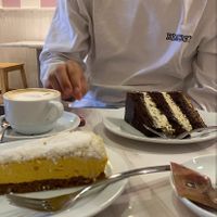 Mango cake, chocolate pistachio cake, oat milk cappuccino! All vegan ! at 2Hearts Bakery in Palermo