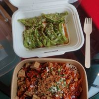 Spinach coloured veggie dumplings + tofu bibimbap with noodles at Kim Chi Korean Cafe in Hitchin