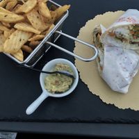 Vegan burrito with fries and guacamole at Old England Pub in Padua
