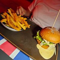 Chicken vegan burger with cheesy sauce at Old England Pub in Padua
