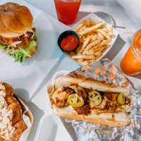 Vegan Chikn Sando, Vegan Philly Steak, Almond croissant (my fave), garlic fries, and some fresh squeezed juices at No Moo Foods in Sacramento