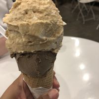 Dulce leche with coconut on top. Nutella at the bottom.   at Ainara Helados in Buenos Aires