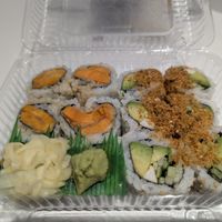 R1 Sweet Yam Tempura Roll on the left, R7 California Roll on the right at Tenon Vegan Sushi in Toronto