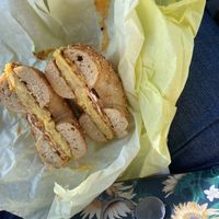 Bacon, egg, and cheese on a garlic bagel  at Ben & Esther's Vegan Jewish Deli in Portland