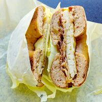 Bacon egg and cheese sandwich on jalapeño bagel at Ben & Esther's Vegan Jewish Deli in Portland