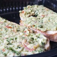 Smashed avocado on toast at RAW & BOWL'D in Amman