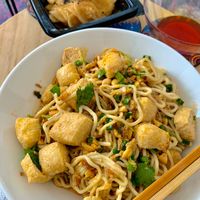 Dan dan noodles & marinated radish. at Noodle Master in Helsinki