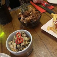 Charred hispi cabbage, 
coffee & Dijon dressing, sesame, chilli  at Seven Lucky Gods in Bristol