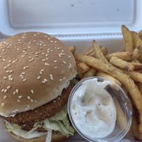 Crispy chicken sandwich with the amazing fries again  at Bougie Vegan in Belton