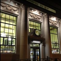Outside storefront at night at Mariposa Food Co-op in Philadelphia