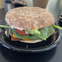 Breakfast sandwich (tofu, cheese, sausage, chipotle mayo, avocado, spinach, and tomato)  at Farm2Farmacy in Chandler