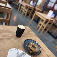 Lovely Truffle Tempeh Bagel. With oat milk latte. Kind staff    at The Well Bean Co in East London