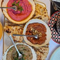 Dips to share with pita (Beetroot Hummus, Baba Ganoush and Muhammara) at Ousia Soulful Kitchen in Limassol