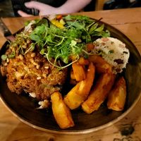 Cauliflower steak with chips, couscous, and salad at The Dirty Bottles in Alnwick