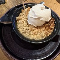 Apple crumble with vegan ice cream  at The Dirty Bottles in Alnwick