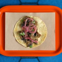 Taco with mushrooms and cebollas moradas ! at Poncho Tacos in Athens