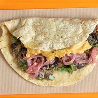 Quesadilla hongos epazote con queso vegano! at Poncho Tacos in Athens