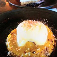 Poached pineapple with coconut, chilli, ginger and sorbet, and vanilla pod cheesecake at Harbour Lights in Paignton