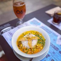 Indian curry w/tofu, vegetables, cashews & rice  at Aguaribay in Barcelona