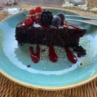 Chocolate cake with raspberry topping  at Le Serre by Vivi in Rome