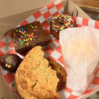Cookie Truffle, Fries Donut, Brownie, PB snickerdoodle cookie (we asked for it to be split, under that is a miso chocolate chunk cookie, and wrapped up is the savory muffin  at Cats Luck Vegan in Neptune City