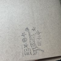 Cute stamped takeout box!  at Cats Luck Vegan in Neptune City